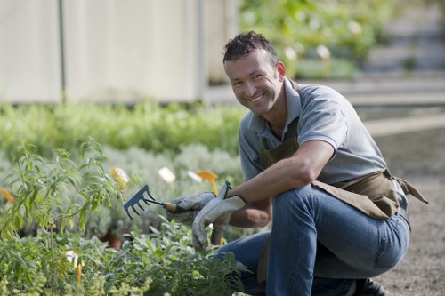 Detailed garden clearance process being executed