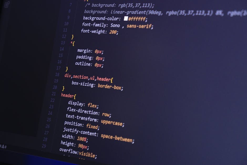 A close-up image of a computer screen displaying lines of code written in a text editor with a dark background and colorful syntax highlighting. The code includes CSS styling elements such as 'positio